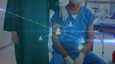 Animation of network of connections over caucasian female and male surgeons. Health, medicine, connections and technology concept digitally generated video.