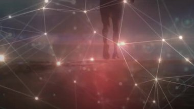 Animation of data processing and light spots over man running. Global business and digital interface concept digitally generated video.