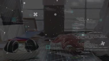 Animation of data processing against mid section of businessman using computer at office. Global networking and business technology concept