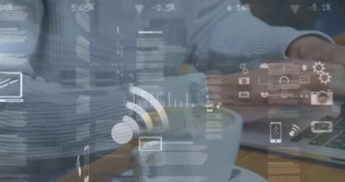 Animation of data processing over caucasian man using laptop. Global business and digital interface concept digitally generated video.