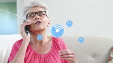 Animation of connections over caucasian senior woman having phone call. Connections, communication and technology concept digitally generated video.