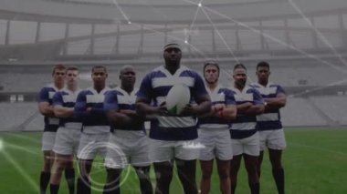 Animation of network of connections over team of diverse male rugby players standing together. Global networking and sports technology concept