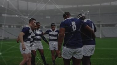 Animation of network of connections over team of diverse male rugby players discussing together. Global networking and sports technology concept