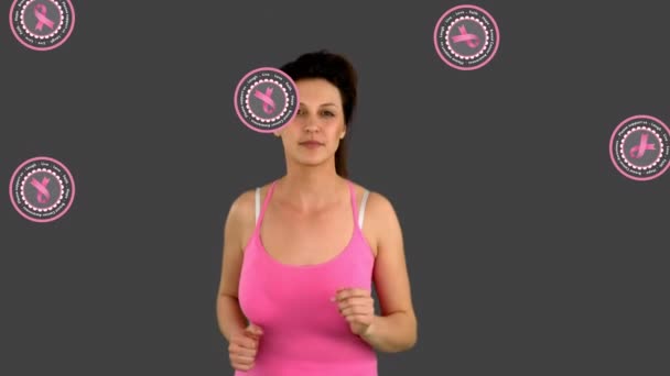 Animation Pinkfarbener Krebsbänder Über Einer Kaukasischen Frau Die Läuft Brustkrebs — Stockvideo