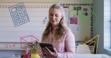 Animation of education and school icons over caucasian female teacher in classroom. Education, learning and school concept digitally generated video.