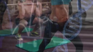 Spor salonundaki beyaz çift üzerinde veri işleme ve DNA ipliği animasyonu. Küresel spor ve dijital arayüz kavramı dijital olarak oluşturulmuş video.