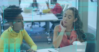 Animation of digital screen with data over diverse female coworkers in office. Business, network, communication, finance and data concept digitally generated video.