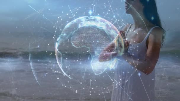 Animation Digital Globe Rotating Caucasian Woman Meditating Sea Cloudy Sky — Vídeos de Stock