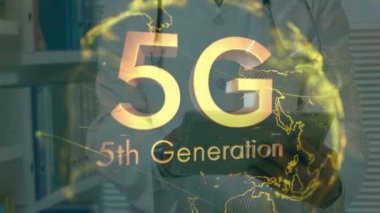 Animation of globe with 5g text over caucasian male doctor using tabblet. Global medicine, healthcare, technology, networks and data processing concept digitally generated video.