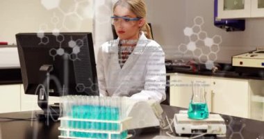 Animation of scientific data processing over caucasian female lab worker using computer. medicine, health, science and technology concept digitally generated video.