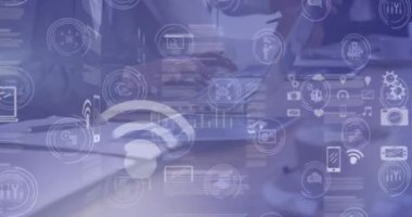 Animation of financial icons over diverse business people. Global business, data processing and digital interface concept digitally generated video.