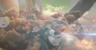 Animation of network of connections and sky with clouds over disabled caucasian man. Global technology, connections and digital interface concept digitally generated video.