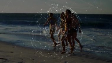 Animation of globe and connections over diverse female friends walking on beach at sunset. sports, healthy, active lifestyle, connections and technology concept digitally generated video.
