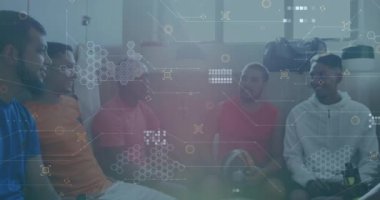 Animation of data processing over diverse football players in changing room. Sports, competition and data processing concept digitally generated video.