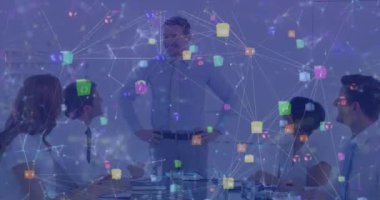 Animation of shapes and icons over diverse business people in office. Global business and digital interface concept digitally generated video.