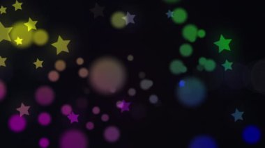 Animation of falling glowing stars over dark background. Color, movement, energy concept digitally generated video.