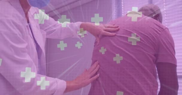 Mehrere Medizinische Symbole Schweben Gegen Den Arzt Der Den Rücken — Stockvideo