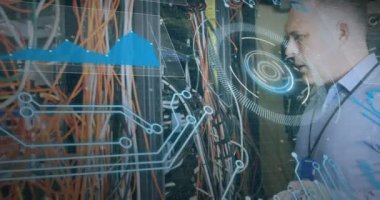 Animation of data processing over caucasian server room worker. Global science, connections, data processing and digital interface concept digitally generated video.