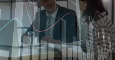 Animation of financial data processing over businesses people. global business, finances, data processing and digital interface concept digitally generated video.