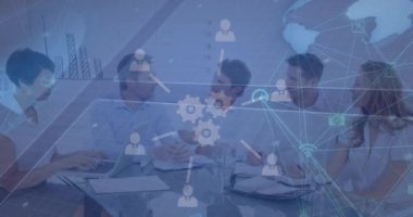 Animation of data processing and icons over diverse business people in office. Global business and digital interface concept digitally generated video.