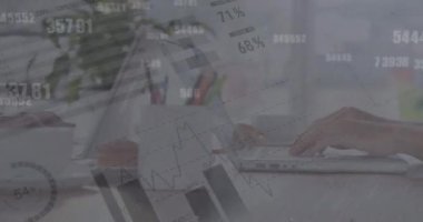 Animation of financial data processing over person using laptop. Global connections, data processing and digital interface concept digitally generated video.