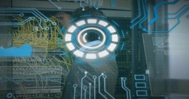 Animation of scan scoping over caucasian male server room worker. Global connections, data processing and digital interface concept digitally generated video.