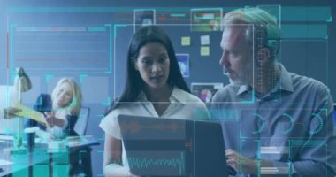 Animation of digital screen with data over diverse coworkers in office. Business, network, communication, finance and data concept digitally generated video.