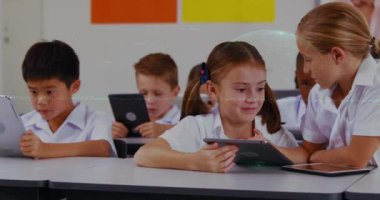 Animation of globe and graph over caucasian girls using tablet and class of diverse pupils. School, education and learning with technology concept digitally generated video.