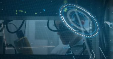 Animation of digital interface over caucasian server room worker. Global business, finances, data processing and digital interface concept digitally generated video.