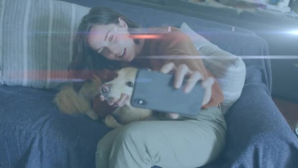 Blue Light Trails Caucasian Woman Talking Selfie Her Dog Couch — Video Stock