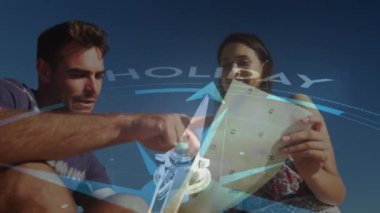 Kafkasyalı çift üzerinde haritalı pusula animasyonu. Tatil ve dijital arayüz kavramı dijital olarak oluşturulmuş video.