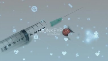 Animation of monkey pox over icons and syringe. Monkey pox, health and pandemic concept digitally generated video.
