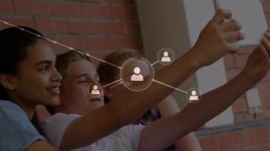 Animation of network of connections over students in classroom. education and learning concept digitally generated video.