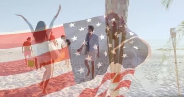 Composite video of american flag waving against group of caucasian friends enjoying at the beach. friendship concept