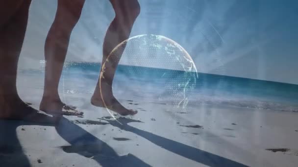 Animation Globe Numbers Rays Caucasian Couple Walking Barefoot Sunny Beach — Wideo stockowe