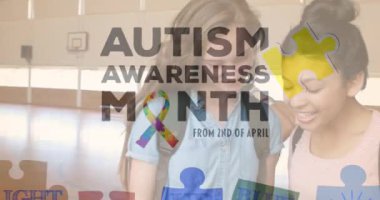 Animation of autism awareness month text over diverse schoolchildren using tablet. autism awareness month and celebration concept digitally generated video.