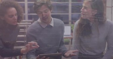 Animation of graphs over diverse coworkers in office. Business, finance and economy concept digitally generated video.