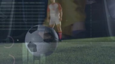 Animation of graphs and financial data over legs of male soccer player with ball on field. Sport, soccer, finance and economy concept digitally generated video.