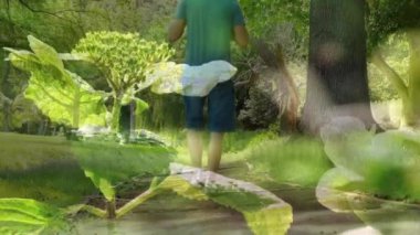 Yaprakların birleşik videosu, babasının oğlunu omuzlarında taşıdığı dikiz aynasıyla karşılaşıyor. Babalık ve aşk kavramı