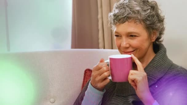 Animation Light Spots Caucasian Woman Holding Mug Drinking Light Movement — Wideo stockowe