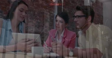 Animation of financial data processing over businesses people. global business, finances, data processing and digital interface concept digitally generated video.