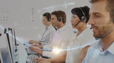 Animation of globe over diverse business people using phone headsets. global business, connections and communication concept digitally generated video.