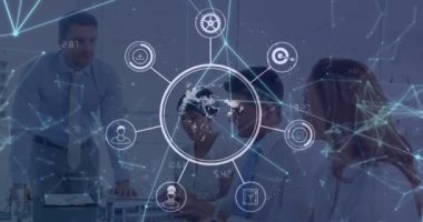 Animation of globe with icons over diverse business people in office. Global business and digital interface concept digitally generated video.
