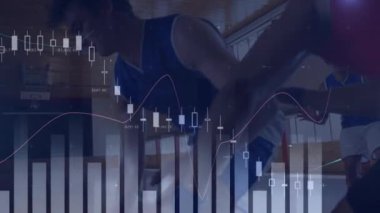 Animation of financial data processing over diverse basketball players. global business, sport and data processing concept digitally generated video.