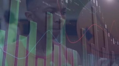 Animation of financial data processing over african american basketball player. global business, sport and data processing concept digitally generated video.
