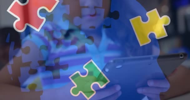 Animation Puzzle Pieces Biracial Schoolgirlusing Tablet Autism Awareness Month Celebration — Stok Video