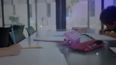 Animation of network of connections over caucasian boy in classroom. School, education, connections and network concept digitally generated video.