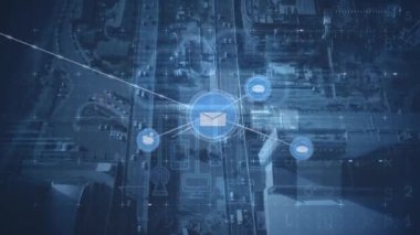 Animation of email and chat icons interconnecting with lines over aerial view of cityscape. Hologram, digital composite, multiple exposure, messaging, communication, internet, technology.