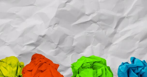 Animation Yellow Red Green Blue Balls Paper Moving Scrunched White — Stockvideo
