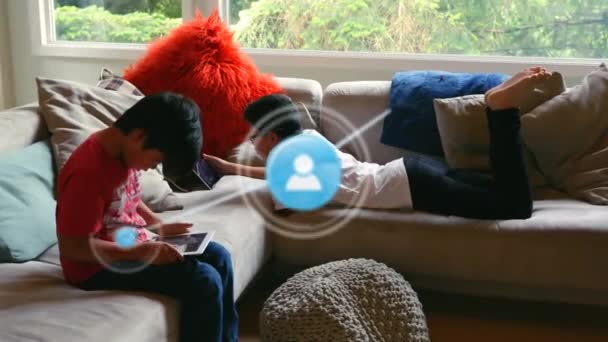 Animation Profile Icons Connecting Lines Asian Brothers Using Digital Tablets — Wideo stockowe